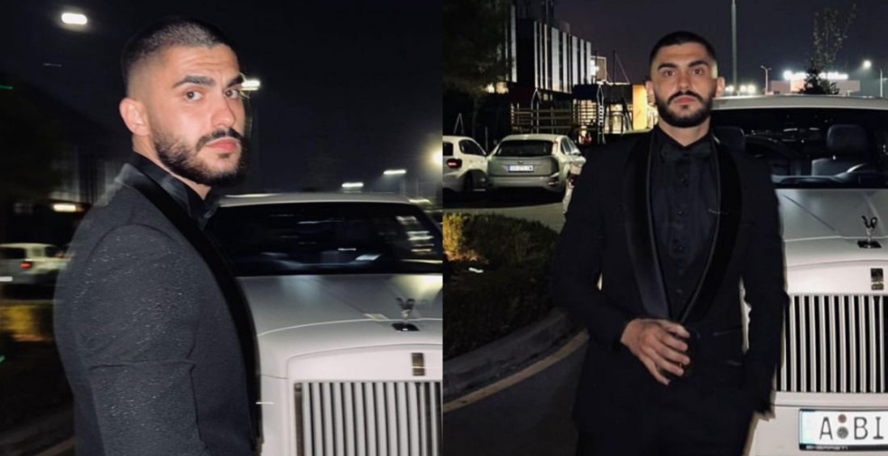 Butrint Imeri pozon pranë makinës super luksoze i veshur në kostum elegant